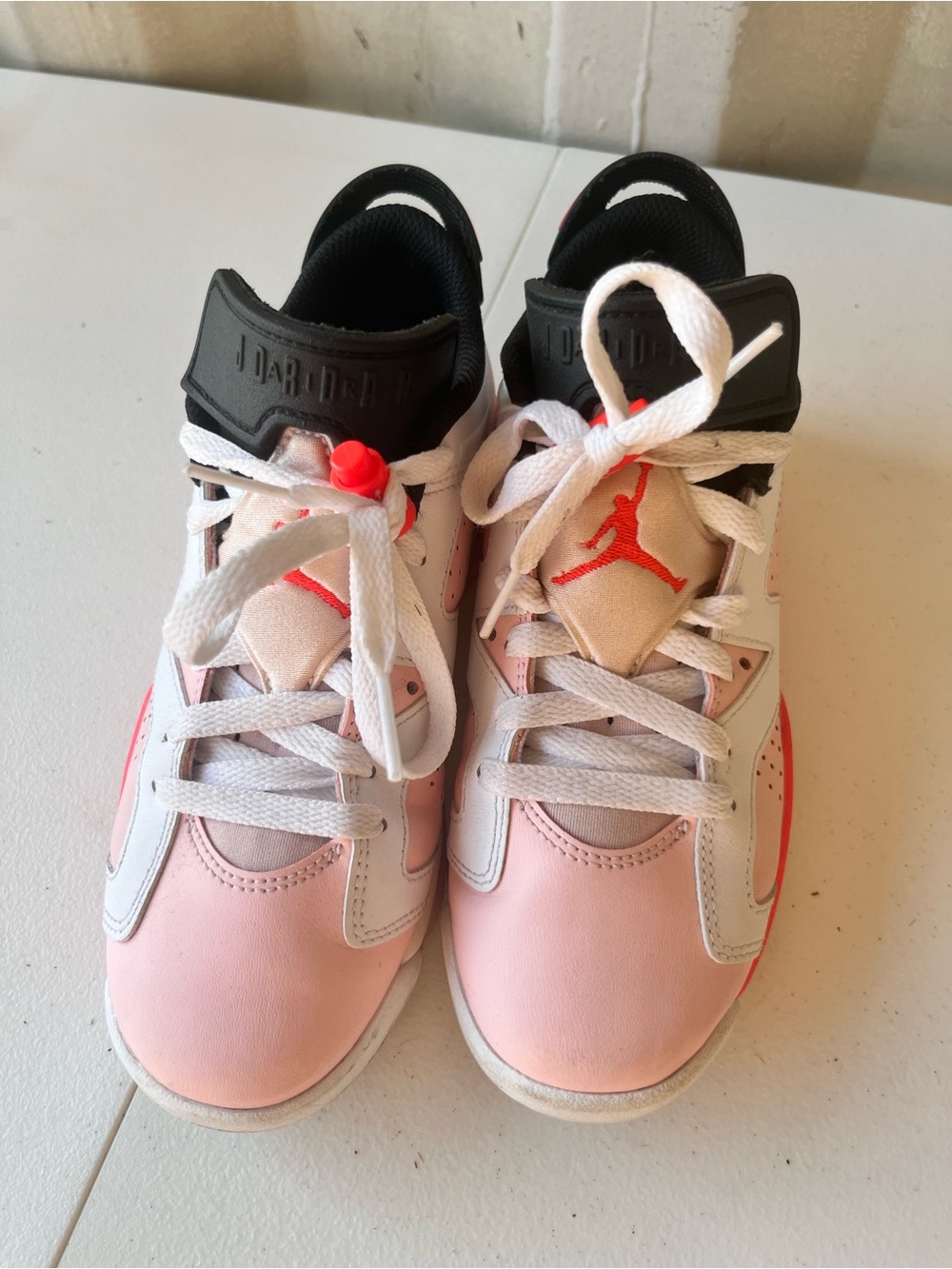 Jordan retro 6’s size 4Y Pink White